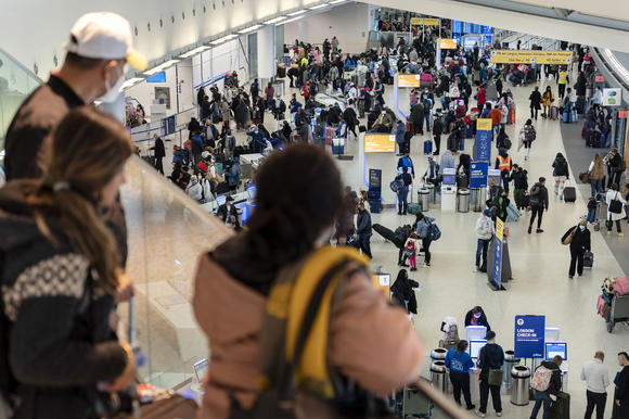 U.S. Flight Cancellations Hit a Record Level as COVID Thins Crews Amid Severe Weather