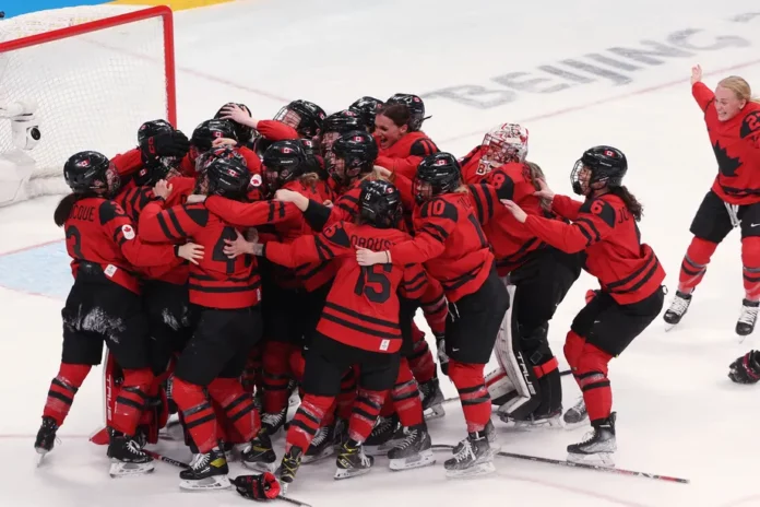 Team Canada celebrates their gold medal