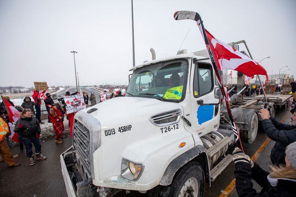 support truck drivers on their way to Ottawa